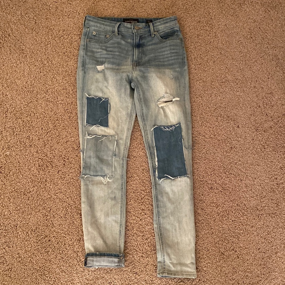 Lucky brand jeans with fun patch work detail size 26